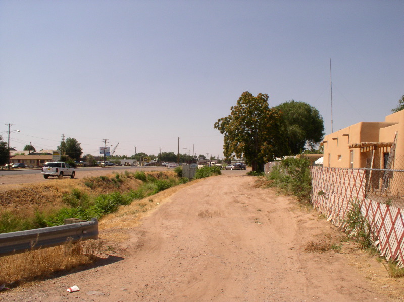Dirt Road along acequia looking south along 2nd
