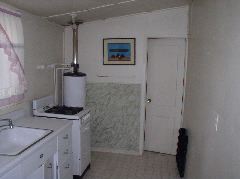 Kitchen in in-law unit of 216. That is the bathroom on the right.