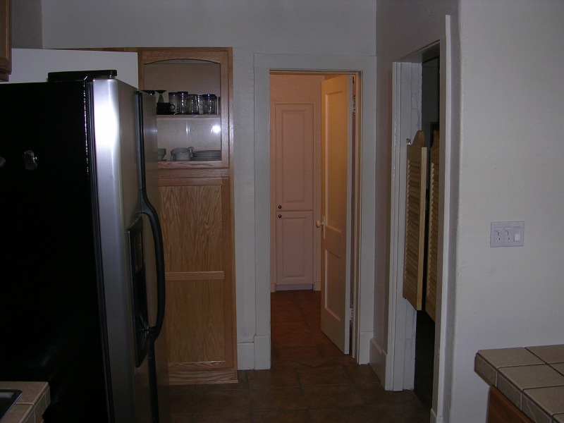 Kitchen to bathroom and bedroom (right)